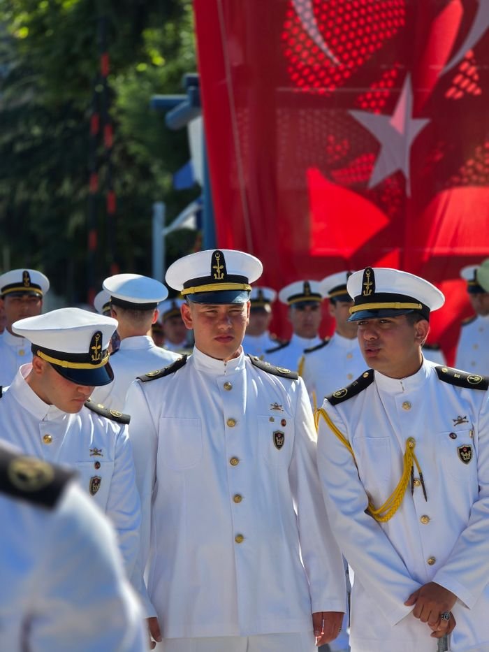 services-02 Turkish naval cadets in uniform participate in a formal ceremony, showcasing discipline and national pride.
